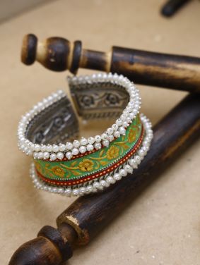 DUAL TONE CUFF BRACELET WITH PEARLS RED AND GREEN MEENA